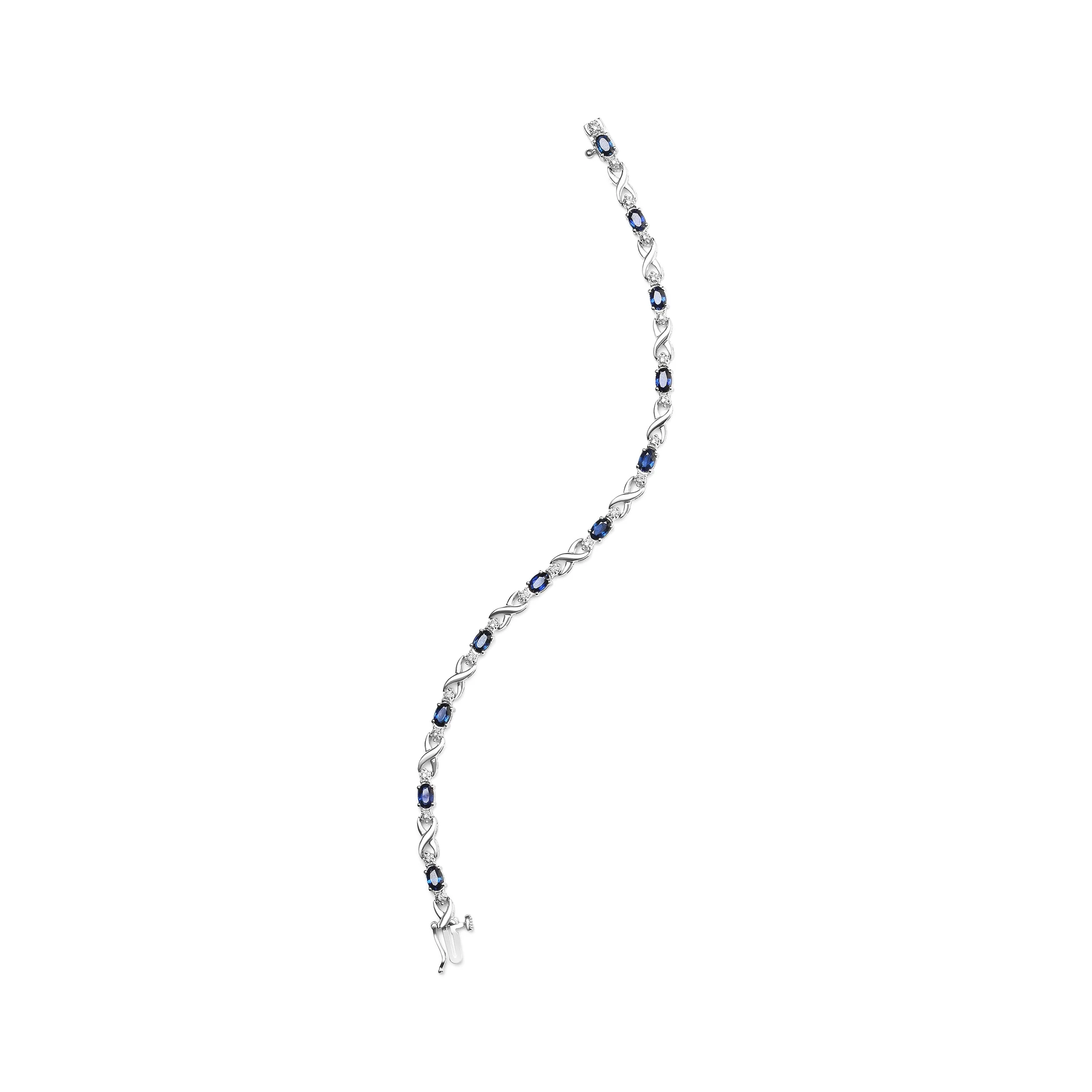 10K White Gold 5x4mm Oval Sapphire Gemstone and 1/10 Cttw Diamond Prong Set "X" Link Bracelet - Size 7" (H-I Color, SI1-SI2 Clarity) - Image 4
