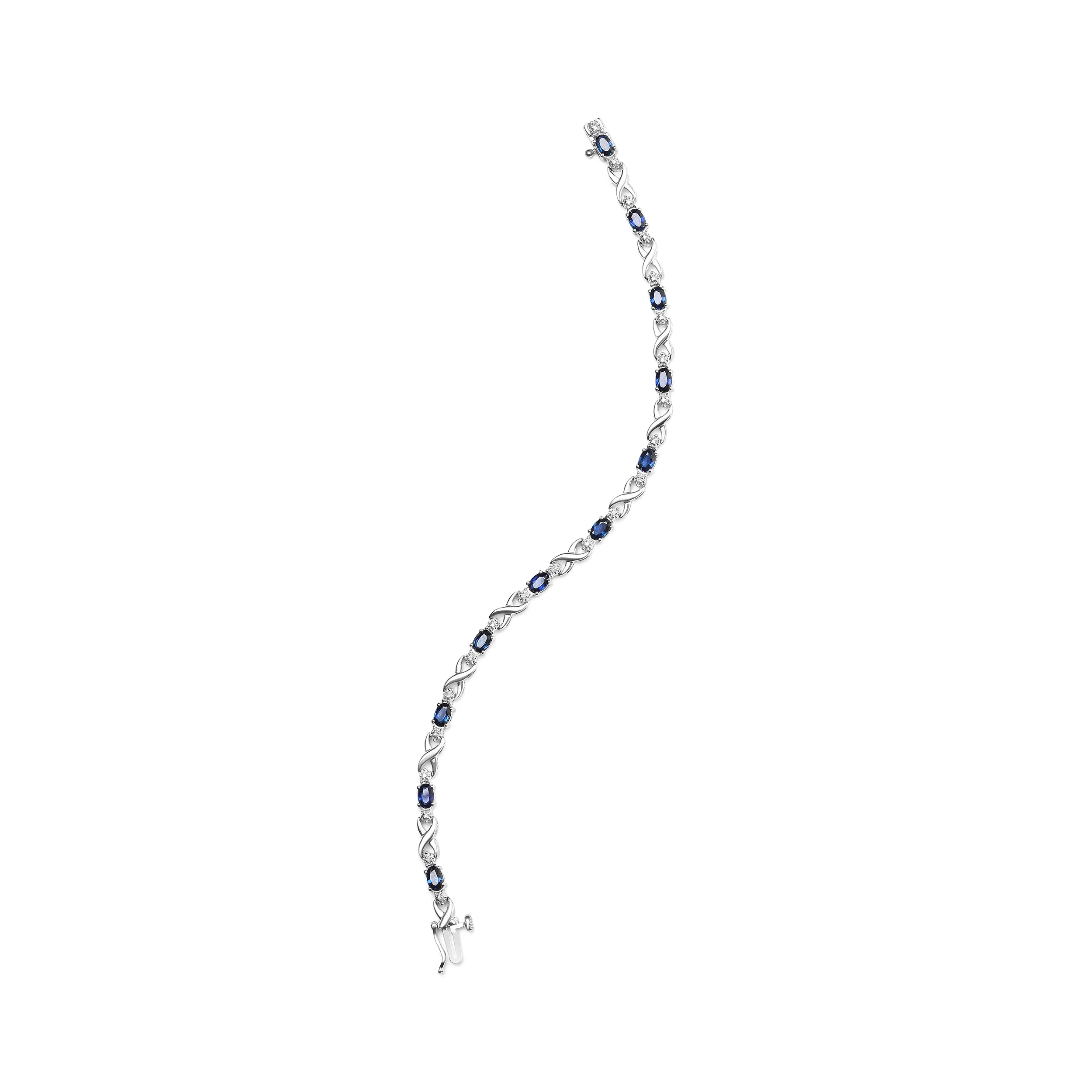 10K White Gold 5x4mm Oval Sapphire Gemstone and 1/10 Cttw Diamond Prong Set "X" Link Bracelet - Size 7" (H-I Color, SI1-SI2 Clarity) - Image 8